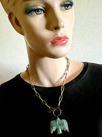 Load image into Gallery viewer, Verdigris Folkart Bird Necklace, antique brass paperclip chain
